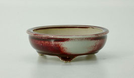 pot rond rouge de cuivre