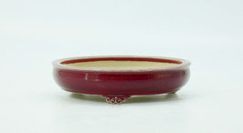 pot rond rouge de cuivre