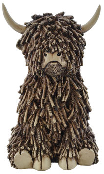 Hochland-Rind sitzend