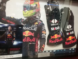 ORIGINAL and SIGNED RACEWORN RACEGLOVES SERGIO PEREZ ABU DHABI 2023