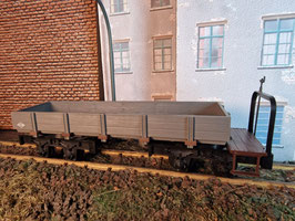 Niederbordwagen Grau mit zwei Drehgestellen