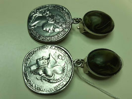Münzen in silber oliv vom Designer Marc Lubera