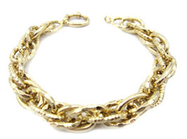 bracciale donna catena ritorto con maglie ovali lucide e godronate in oro giallo 18 kt