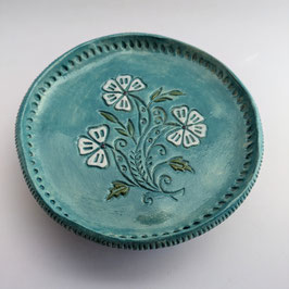 14. Assiette à pieds "fleurs"