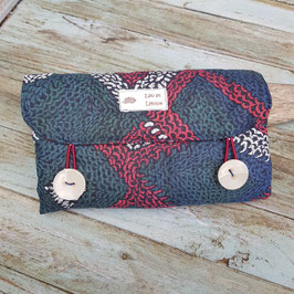 tapis à langer nomade vert bleu rouge
