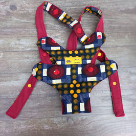 Porte doudou en coton wax à motifs bleus rouges et jaunes