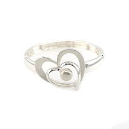 Armband. Herzform mit Perle. Versilbert.