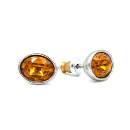 Ohrstecker. Rhodiniert. Ovale topazfarbene Kristalle. 925 Silber.