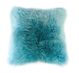Coussin en fourrure naturelle de mouton turquoise