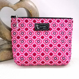 Trousse en wax rose fushia paillettes argentées et logo sur pièce de cuir