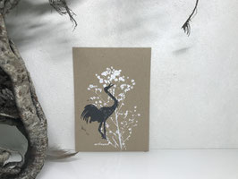 Kranich auf Recyclingpapier, Linoldruck, Mischtechnik