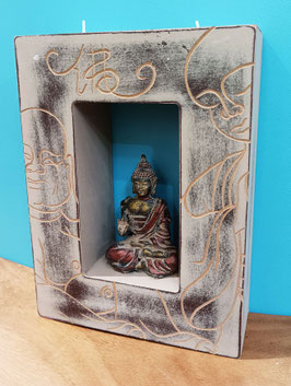 Buddha con candele