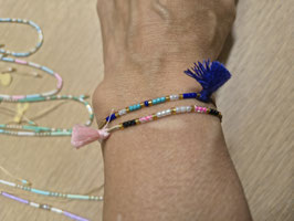 Braccialetto con nappine