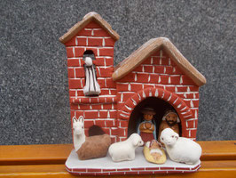 Presepe chiesa con mattoni rossi