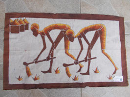 Batik africano uomini nei campi