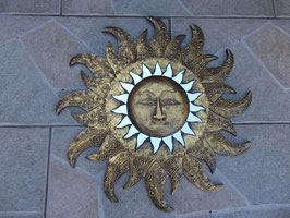 Sole dorato con mosaici e specchietti