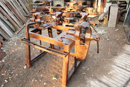 # 3861 -  heavy duty vise table with 4 vises . Biggest would be about 110 lbs weight