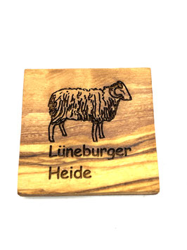Heidschnucke mit Text "Lüneburger Heide"