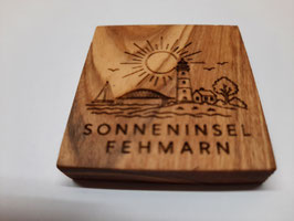 Sonne und Leuchtturm mit Text "Sonneninsel Fehmarn"