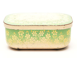 Blikken botervloot en bloemen groen/geel/wit