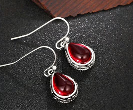 silberne Ohrringe Bohemian mit rotem Stein