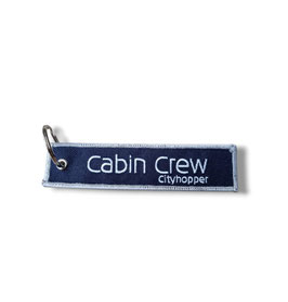 KEYCHAIN CA 1 en 2 CITYHOPPER MAN