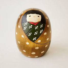 Kokeshi Je Symbolise l'Hiver