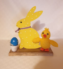 Lapin de Pâques et poussin et cocotier