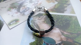 Bracelet en crins de cheval noirs, tressé "en corde" à 4 brins, perle  "coeur/love"