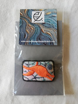 Broche B5