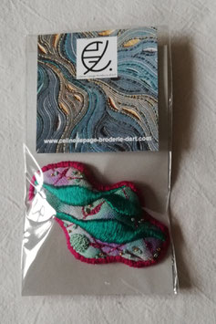Broche B13