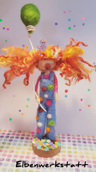 Clownsmädchen mit Luftballon