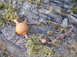 Pendule séphoronton en bois et cuivre
