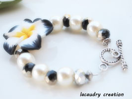 Bracelet élégant Tipanié noir et blanc , cérémonie, mariage  fleur hibiscus,