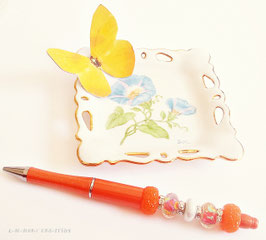 Stylo bille rechargeagle PEPS ORANGE, stylo corps orange, perles  orangesfleuries et blanches