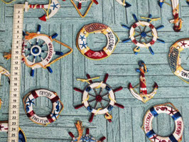 Dekostoff mit Rettungsringen und Ankern