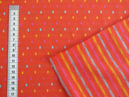 Jerseystoff orange außen mit bunten Punkten und innen mit bunten Streifen