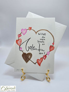 Goldenes Herz mit Handlettering