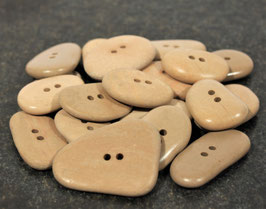 Steinknöpfe aus Kieselsteinen