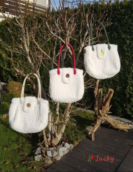 Kuscheltasche mit Schneeflocken