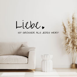 Schriftzug "Liebe ist grösser als jedes Wort"