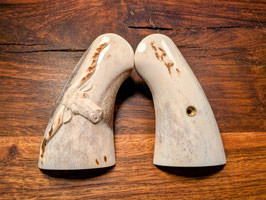Stag grips steer head
