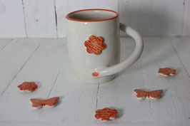 Mug à thé blanc avec fleur orange