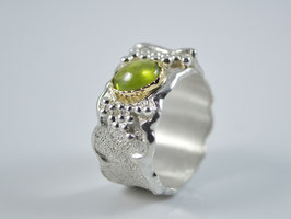 Silberring mit Peridot in 750 Goldfassung