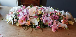 Rouwarrangement met orchideen, rozen, gerbera’s en eustoma