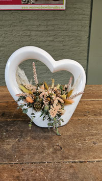 Aardewerk hart met droogbloemen