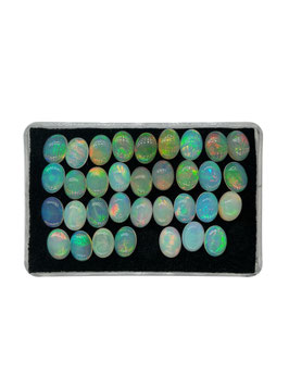 Opal oval cab. 7x5 mm