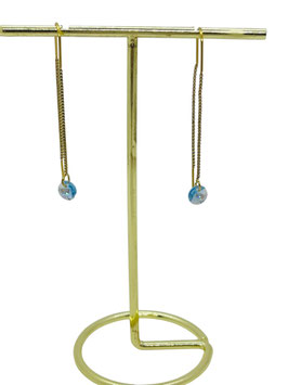 Boucles traversantes doré et cristal bleu pâle