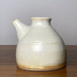 small pale yellow pourer