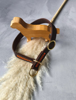 Halsband Zugstopp, Kreuznaht